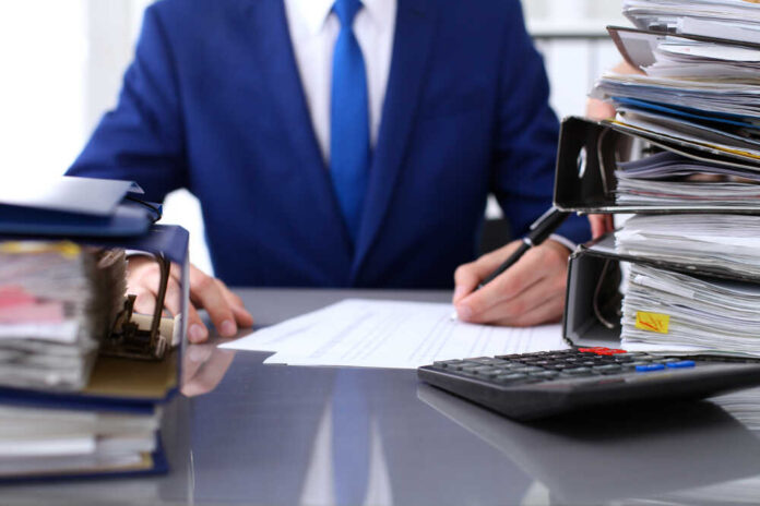 Bookkeeper,Or,Financial,Inspector,And,Secretary,Making,Report,,Calculating,Or