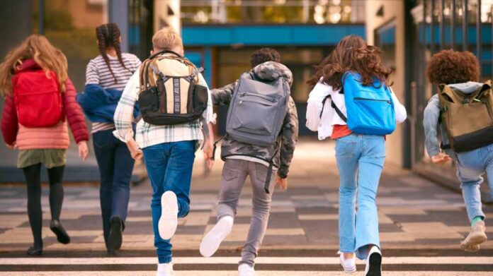 Group,Of,Secondary,Or,High,School,Pupils,Running,Away,From