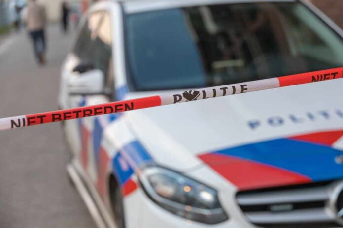 Politie,,Dutch,Police.,Close,Up,Of,Barrier,Tape,Or,Afzetlint