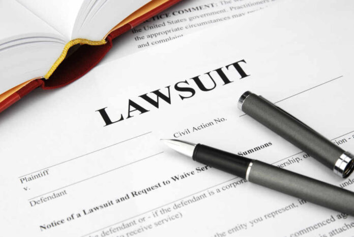 Lawsuit,Form,With,Filler,And,Book