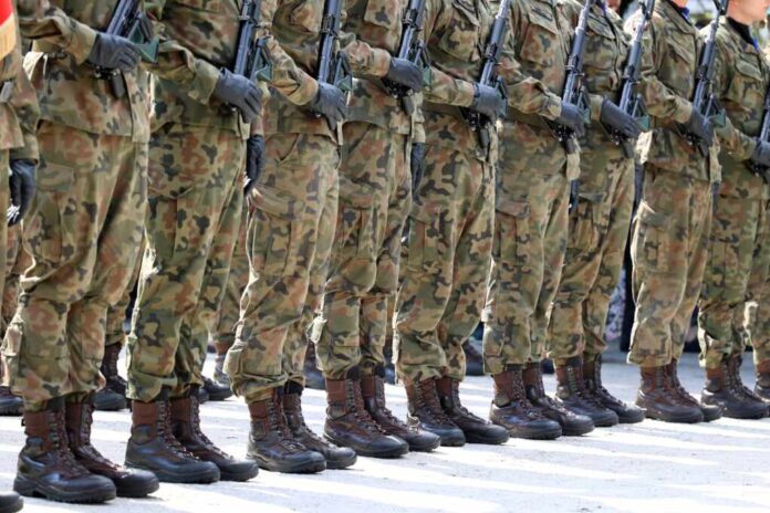 People,In,Military,Uniforms,At,A,Meeting.,The,Army,Is