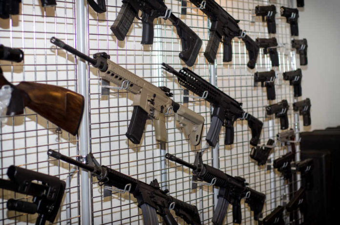 Gun,Wall,Rack,With,Rifles
