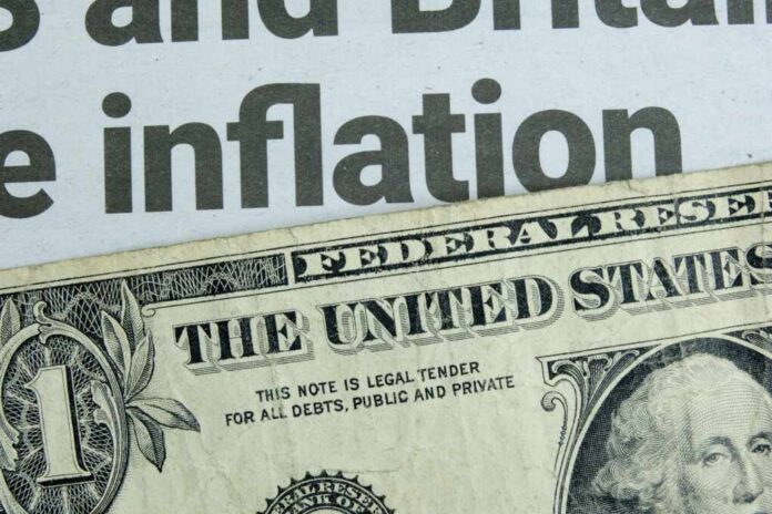 A,Us,One,Dollar,Bill,Lying,Below,A,Newspaper,Headline
