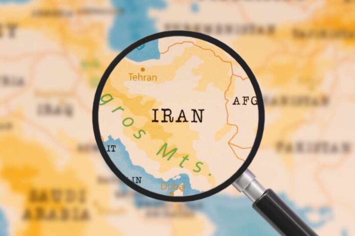 A,Magnifying,Glass,On,Iran,Of,The,World,Map