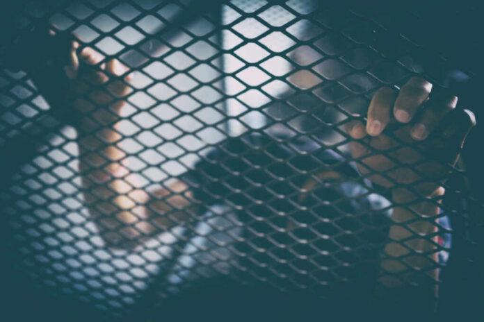 Hopeless,Man,In,The,Cage,,Human,Trafficking