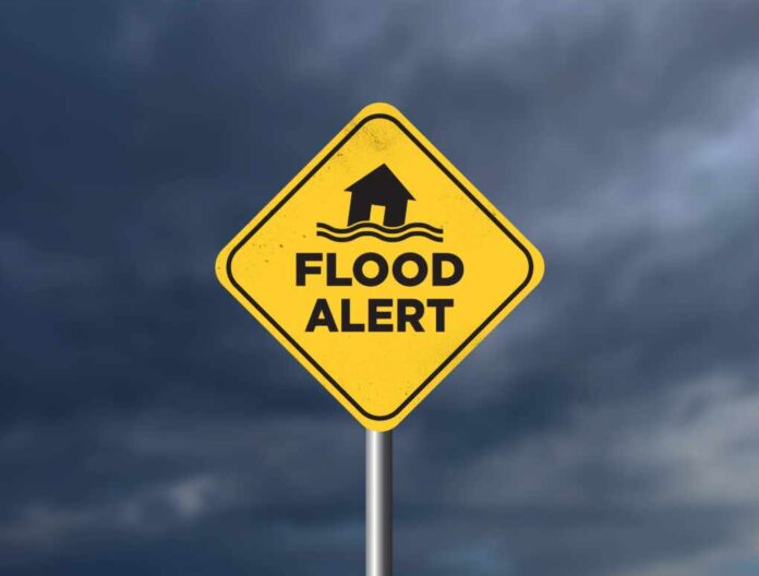 Flood,Alert,Concept,Background.,Flooded,Building,And,A,Flood,Area