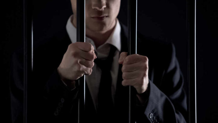 Politician,Holding,Prison,Bars,,Official,Male,Arrested,On,Money,Laundering