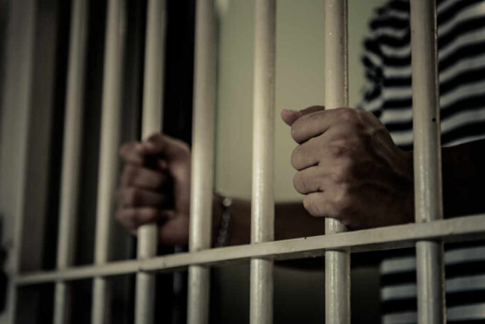 Hands,Of,Men,Desperate,To,Catch,The,Iron,Prison,prisoner,Concept