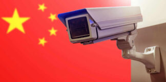 Surveillance camera in front of the Chinese flag