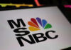 Close-up of the MSNBC logo featuring a colorful peacock design