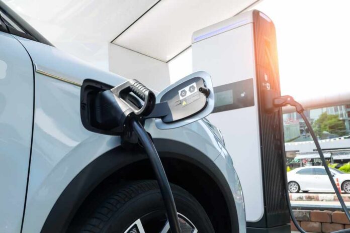 Electric vehicle connected to a charging station