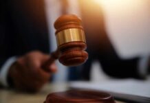 Judge Strikes Down Virginia’s Social Media Law A judge's gavel being raised in a courtroom setting