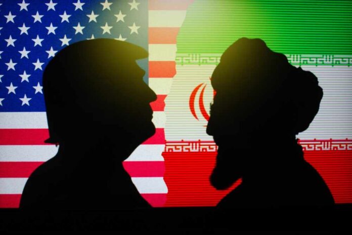 Silhouettes of two figures against the backgrounds of the American and Iranian flags