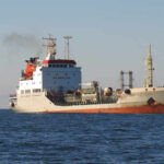 A cargo ship sailing on the ocean