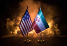 Flags of the United States and Iran displayed together