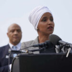 Congresswoman Under Fire: Massive Wealth Leap Probed Ilhan Omar speaking at a press conference with André Carson in the background