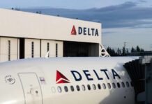 Close-up of a Delta Airlines airplane at an airport with the Delta logo visible