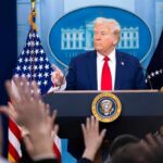 Gunman’s DC Journey Exposes Security Gaps A political leader addressing the media at a press conference