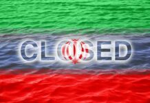 Graphic representation of the word 'CLOSED' overlaid on the Iranian flag with a water background