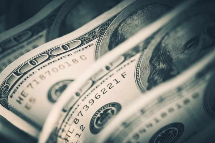 shutterstock_393692620.jpg Close-up of folded hundred dollar bills