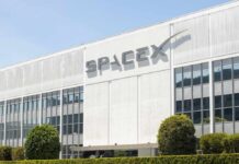 Pentagon’s $4B Bet: SpaceX Takes Point Exterior view of the SpaceX building with a prominent logo