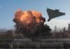 A drone flying above an explosion at an industrial facility