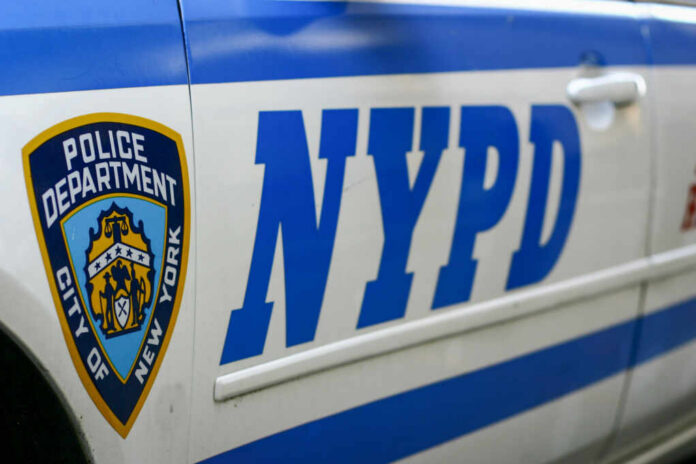 shutterstock1846840378jpg Close-up of a New York Police Department vehicle with badge and NYPD lettering