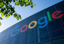 Google’s Gatekeeper Blocks ‘Unapproved’ Phones Google logo displayed on a glass building with green leaves in the foreground