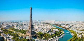 Aerial view of the Eiffel Tower in Paris with the Seine River and cityscape
