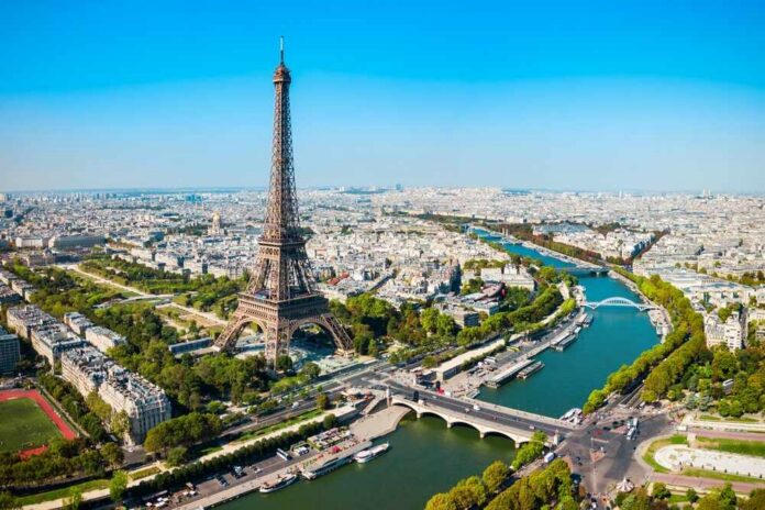 Aerial view of the Eiffel Tower in Paris with the Seine River and cityscape