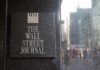 The Wall Street Journal plaque on a building exterior