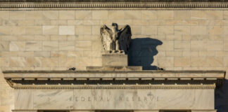 Facade of the Federal Reserve building featuring an eagle sculpture