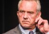 RFK Jr. Targets America’s Kitchen Close-up of a man in a suit with a serious expression