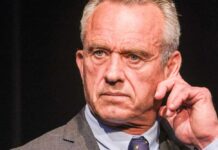 RFK Jr. Targets America’s Kitchen Close-up of a man in a suit with a serious expression