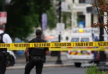 Church Raid Unmasks Fentanyl Pipeline Police officers near a crime scene marked by caution tape