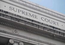 Missed Hearing Triggers Jill Stein Warrant Supreme Court building facade with classical columns