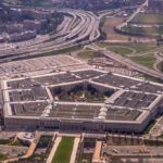 The Pentagon building seen from above with surrounding highways and parking lots