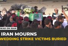 Funerals held in Iran for wedding party victims of US missile strikes