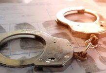 Handcuffs on a fingerprint form