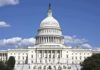 United States Capitol building with white dome under blue sky