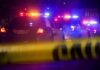 Houston Townhome Horror After Court Clash Police cars with flashing lights behind yellow caution tape at night