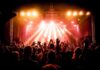 concert crowd under bright stage lights