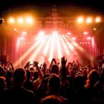 concert crowd under bright stage lights