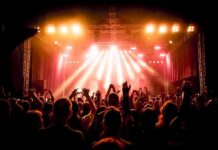 concert crowd under bright stage lights