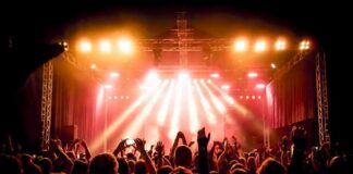 concert crowd under bright stage lights