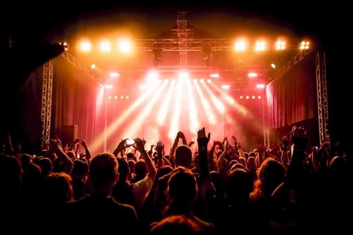 concert crowd under bright stage lights
