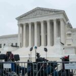 U.S. Supreme Court building with media equipment set up outside