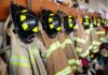 Paperwork Twist Blocks EMT Firefighter Firefighter helmets and turnout coats hanging on hooks