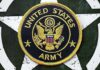 United States Army embroidered patch on a green star background