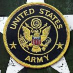 Pentagon Shuts Down Iraq Mission United States Army embroidered patch on a green star background